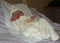 Elisha on the bed in hospital