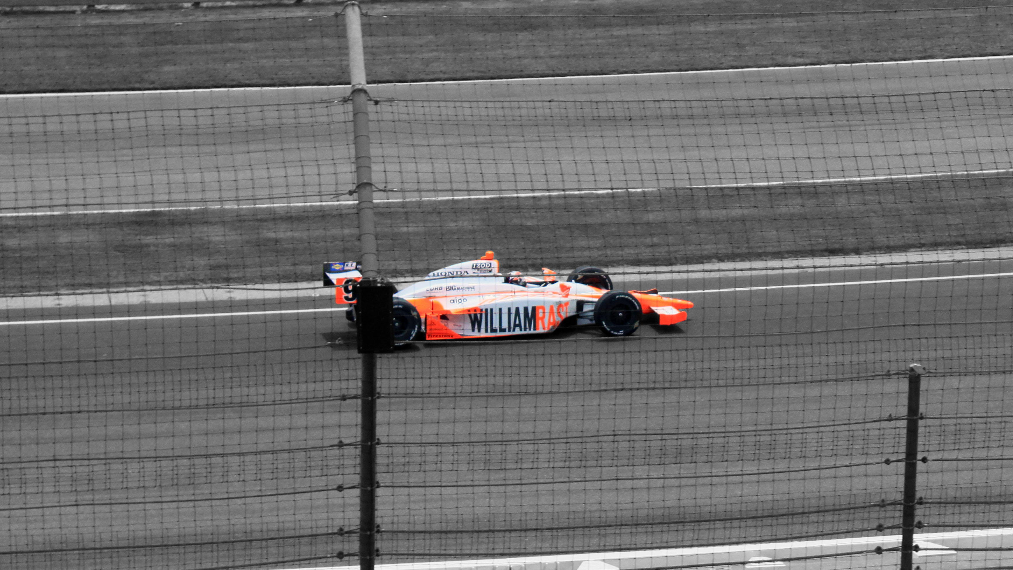 Dan Wheldon's in turn three during his victory lap at the Centennial Indianapolis 500